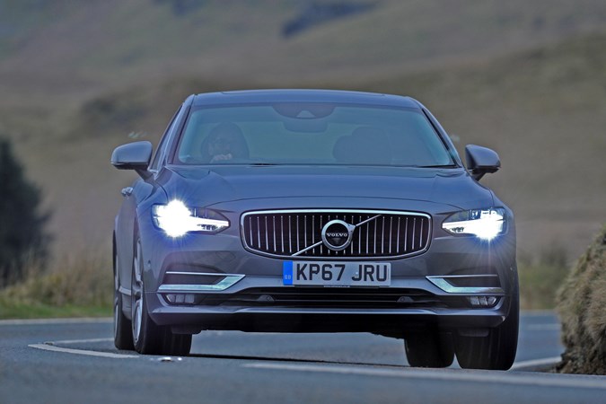 Grey 2017 Volvo S90 front elevation driving with headlamps on
