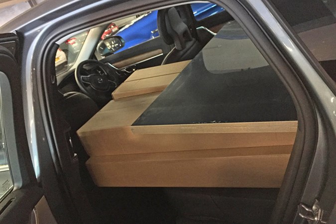 Grey 2017 Volvo S90 rear seat folded at Ikea Sheffield