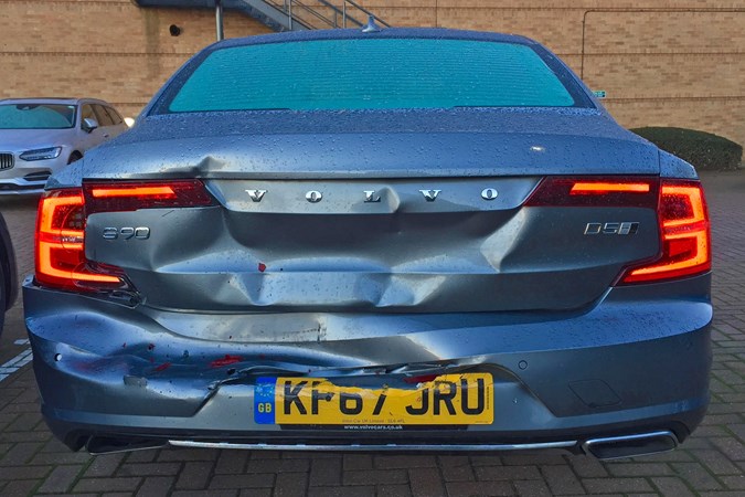 Grey 2017 Volvo S90 rear-end crash damage