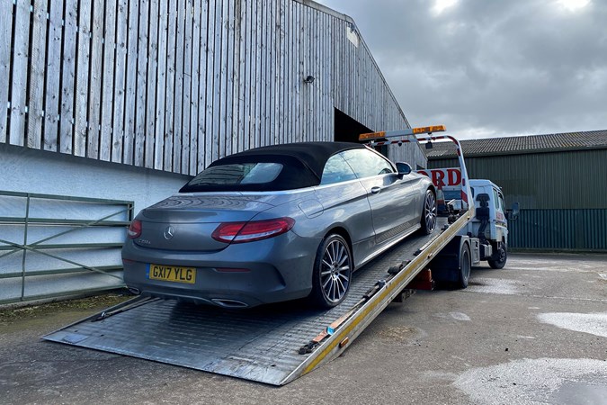 C250d Cabriolet on flatbed recovery truck, two flat tyres, Mercedes Assist