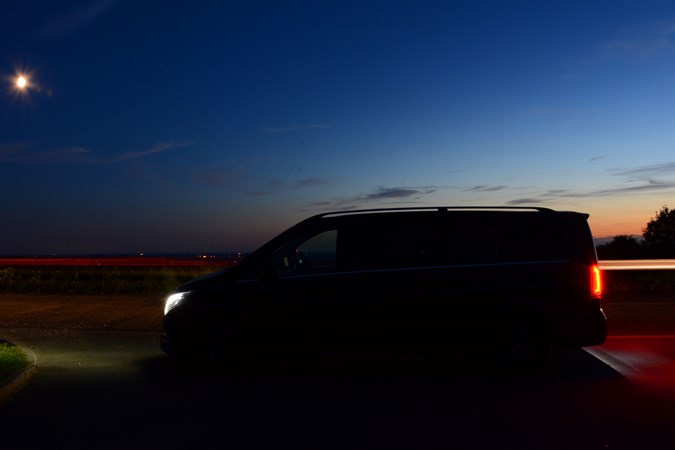 Blue 2017 Mercedes-Benz V-Class MPV silhouette at dusk