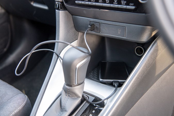The USB connection, smartphone USB cable and Google Pixel 5 in the Toyota Yaris Design
