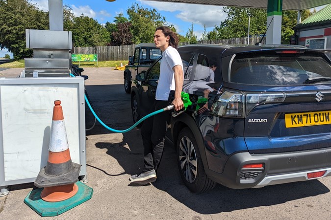 Suzuki S-Cross refuelling - and a driver who's annoyed by the price