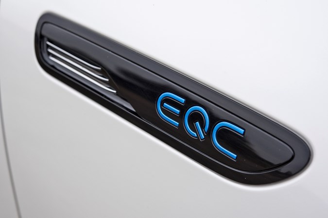 White 2019 Mercedes-Benz EQC wing badge