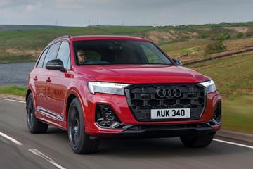 Audi Q7 (2025) review: front three quarter driving, red paint