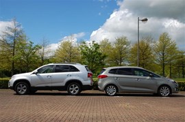 Two Kias. Seven seats each. Which is best? It's Sorento versus Carens