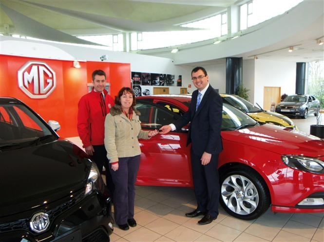 Parkers competition winner picks up her MG6 for the year. She also secures free petrol and insurance for the year too.