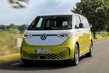 Volkswagen ID. Buzz review: front three quarter driving, yellow and white paint