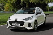 Mazda 2 Hybrid review: front three quarter driving, white paint