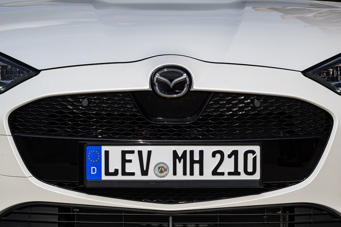 New five-point grille distinguishes 2024 Mazda 2 Hybrid better from its Yaris donor