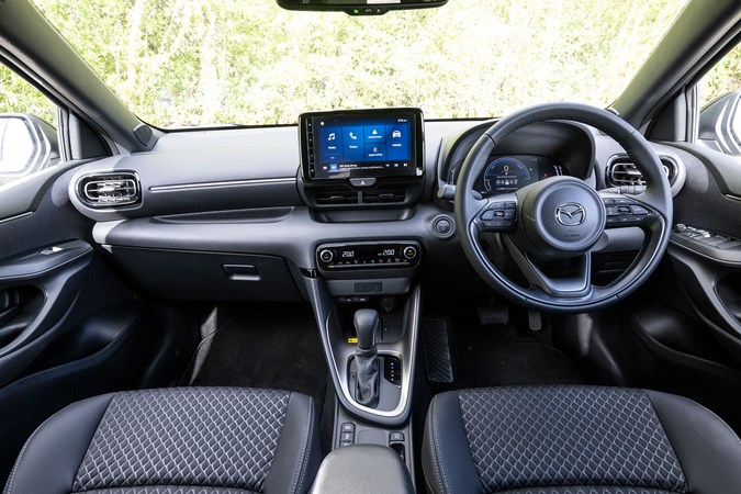 Mazda 2 Hybrid review: dashboard and infotainment system, black upholstery