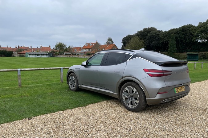 Genesis GV60 parked on grass