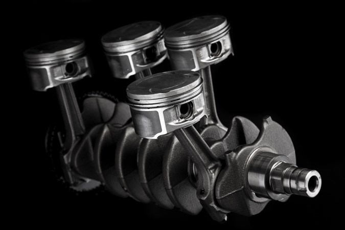 Image of car engine pistons connected to a crankshaft