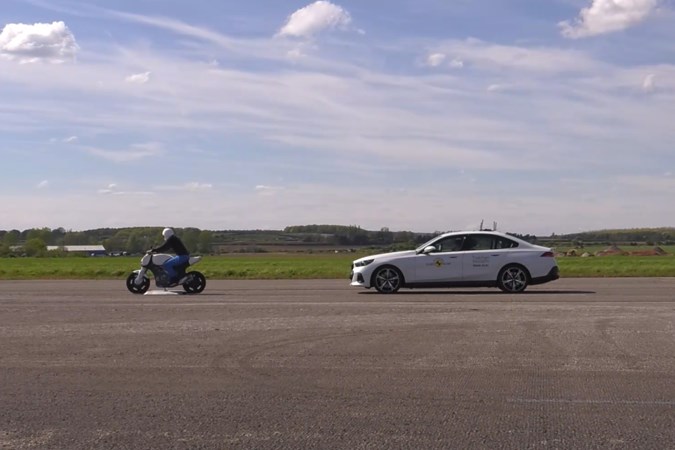 Euro NCAP vulnerable road user test between BMW i5 and motorcycle