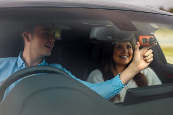 A dash cam being used in a car.