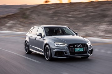 Audi RS3 driving front, grey