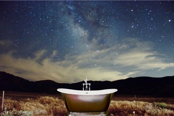 Bathtub underneath a night sky