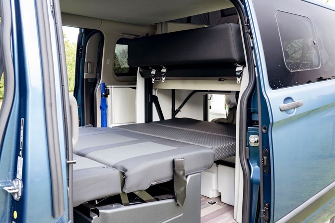 Ford Transit Custom Nugget interior showing bed unfolded.