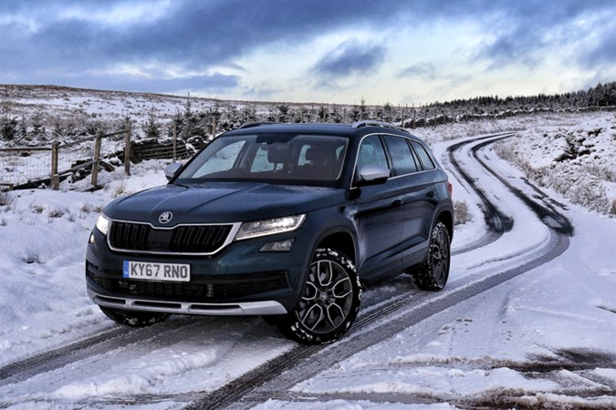 Image of a Skoda Kodiaq stopped at the top of a snow covered hill