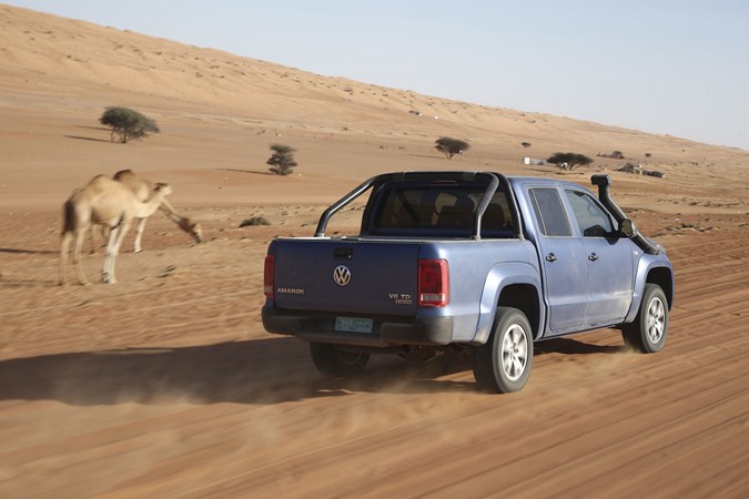 VW Amarok V6 TDI 258hp review - rear driving view with camels