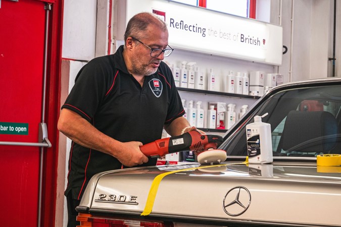 Karl Heath from Autoglym applying renovator to car boot