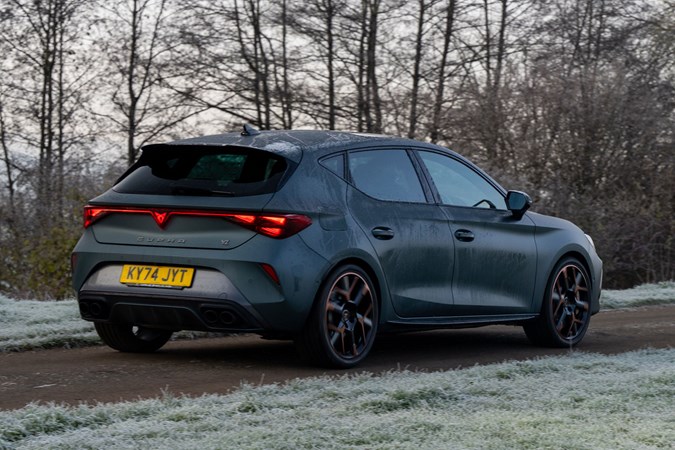 Cupra Leon (2025) review: front three quarter driving, matte grey paint, close up