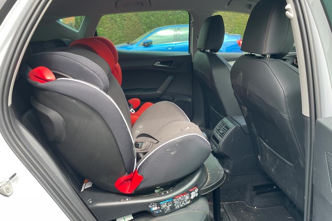 Cupra Leon rear seats with child seat behind driver