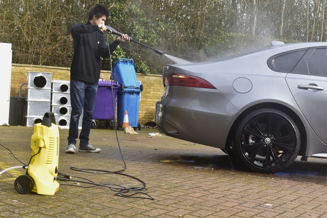 The Karcher K2 is used by Aaron Hussain to clean a grey car