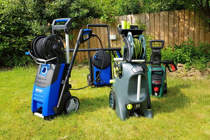 Four pressure washers grouped together
