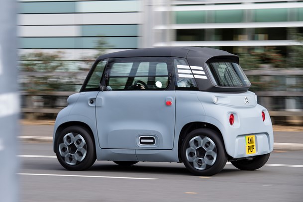 Citroen Ami (2022) review: rear three quarter cornering shot, grey car, stripes on rear quarter panel