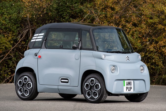 Citroen Ami review: front three quarter static, grey car, stripes on rear quarter panel