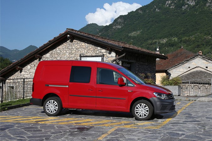 VW Caddy TGI review - side view, parked by mountain