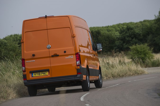 VW Crafter vs Mercedes Sprinter - Crafter, rear view, driving
