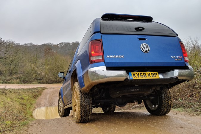 VW Amarok long-term test review - off-road, rear view, pointing downhill