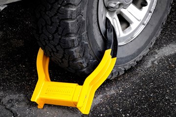 Wheel clamp on car wheel