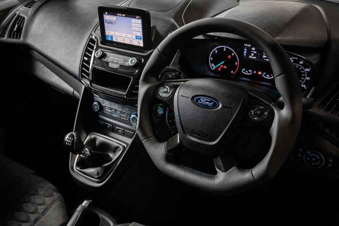 MS-RT Transit Connect - cab interior showing custom steering wheel, infotainment and manual gearbox, 2019
