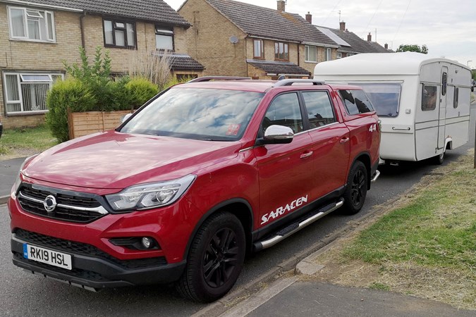 A Ssangyong Musso with a Caravan, photograph by Luke Neal