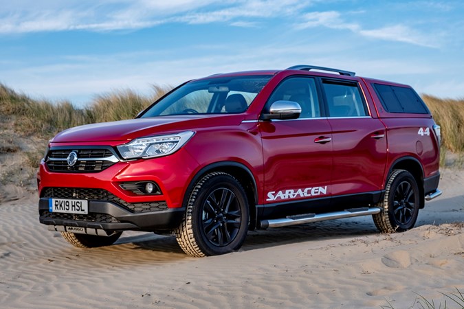 2019 red Ssangyong Musso Saracen on beach