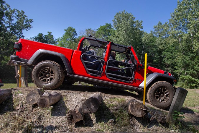 2019 Jeep Gladiator review - red, side view, tube doors, off-road