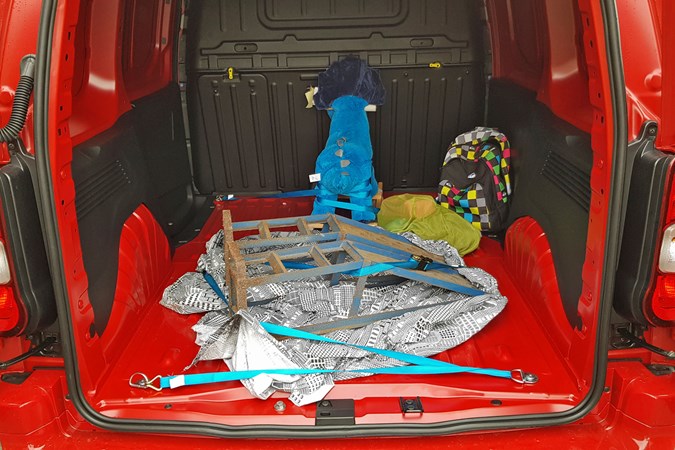 Vauxhall Combo Cargo long-term test review - load area with rocking dinosaur and car ramps