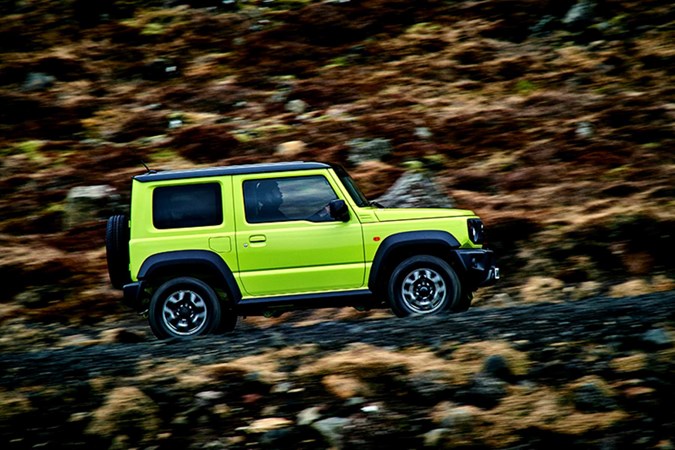 Yellow 2020 Suzuki Jimny side elevation driving