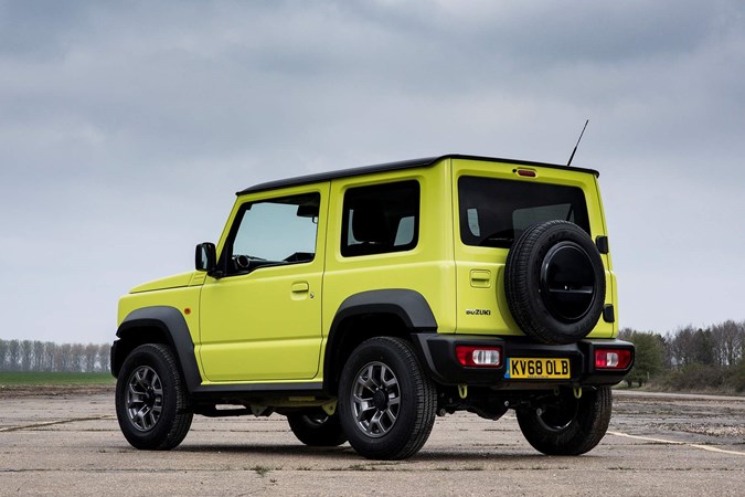 Yellow 2019 Suzuki Jimny rear three-quarter