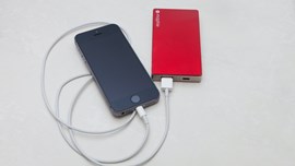 iPhone being charged from a power bank