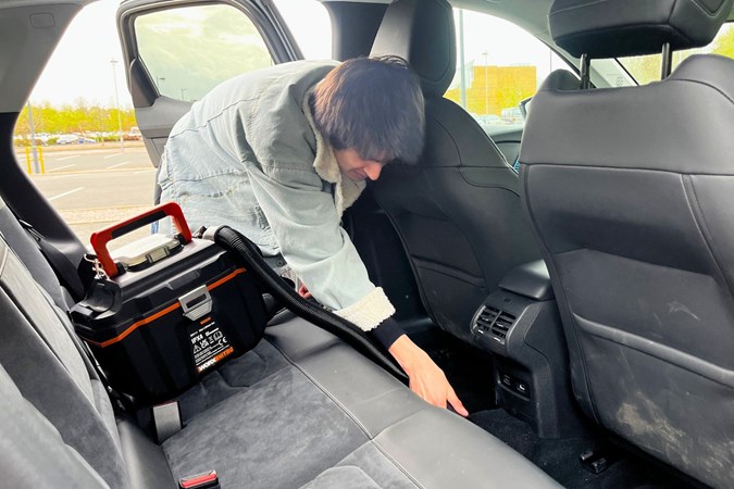 Aaron Hussain cleans a car with the Worx