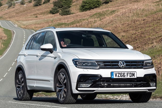 Best used family 4x4s: Volkswagen Tiguan, front three quarter driving, white paint, British B-road