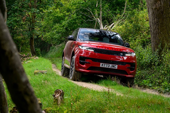 How to drive off-road: Range Rover Sport, driving on a gravel road, low angle, blue paint