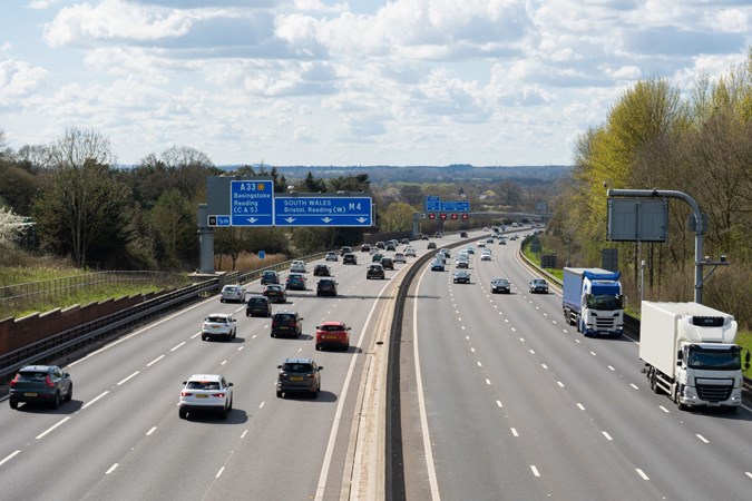 A motorway with cars travelling on it