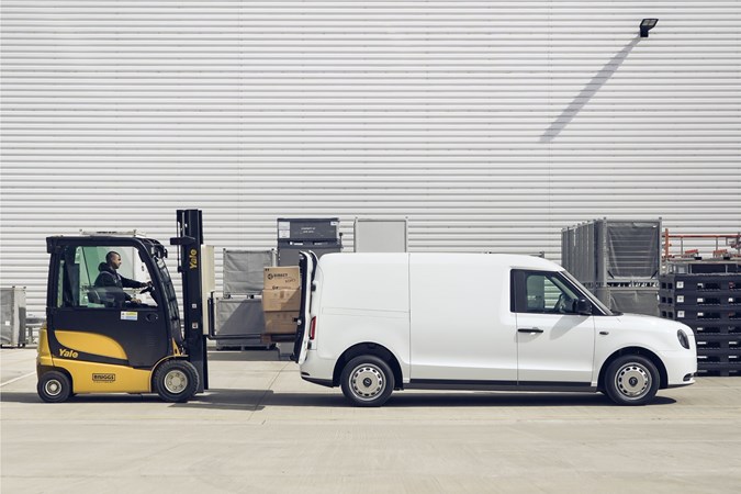 LEVC VN5 electric van - side view, being loaded with pallet, 2020