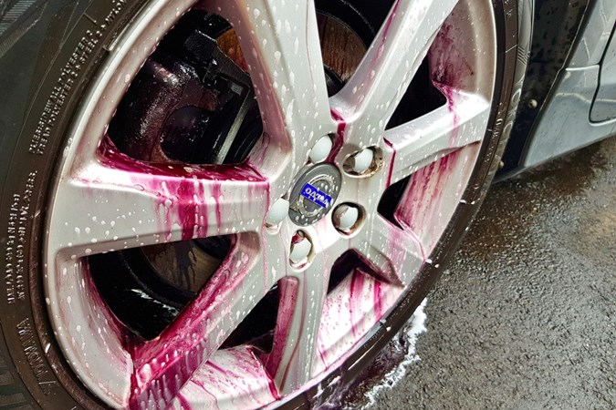 Gyeon Q2M Iron Wheel Cleaner agitating on Volvo wheel