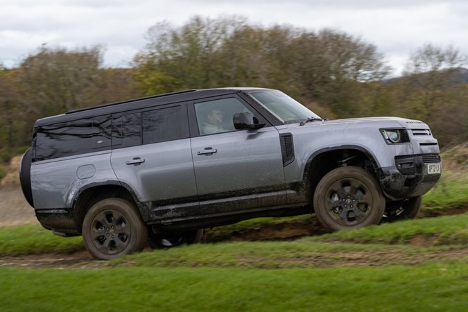 Land Rover Defender 130 grey side off-road - Best SUVs for towing